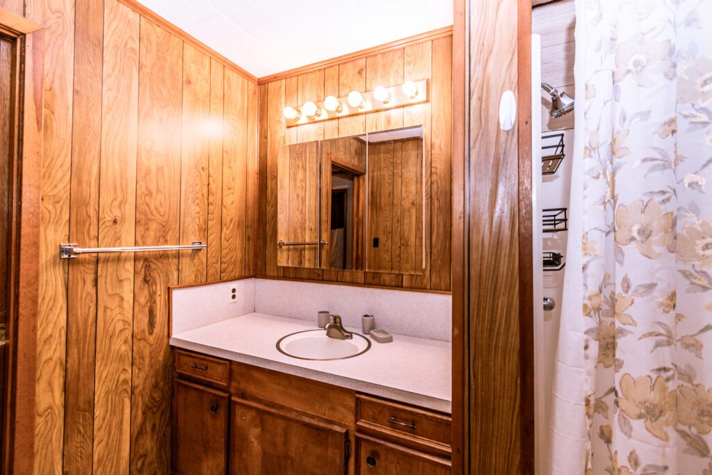 The Arlin Hays Tiny Home in San Augustine, a nice bathroom sink area