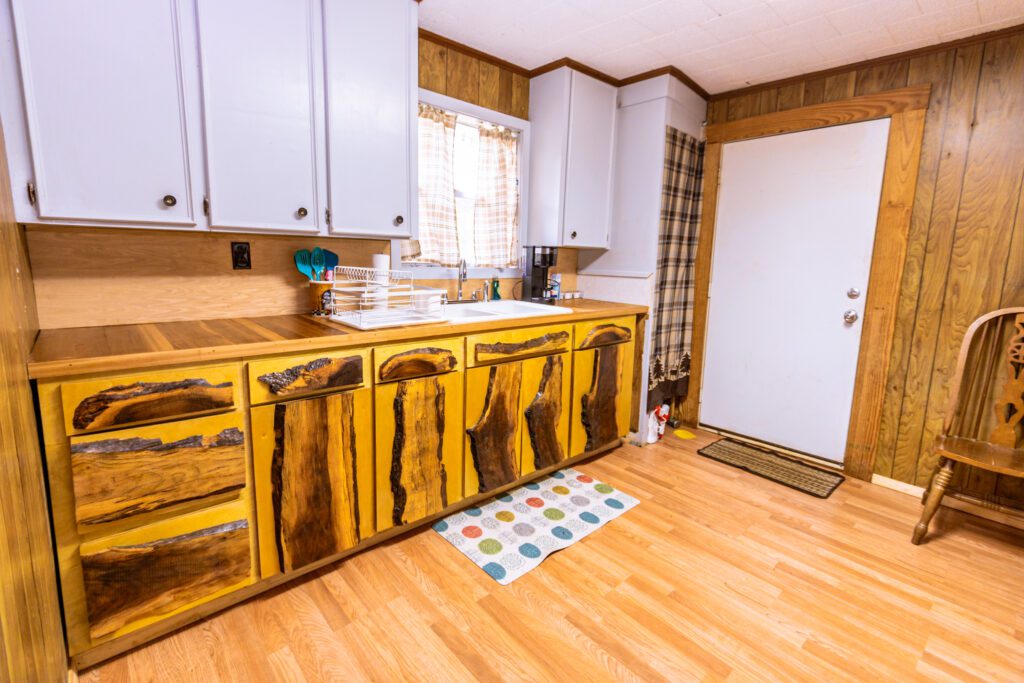 The Arlin Hays Tiny Home in San Augustine - an interesting kitchen. The cabinets are beautiful and one of a kind.